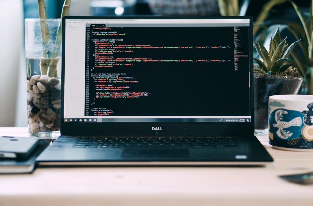Laptop and desktop workspace for website design and development